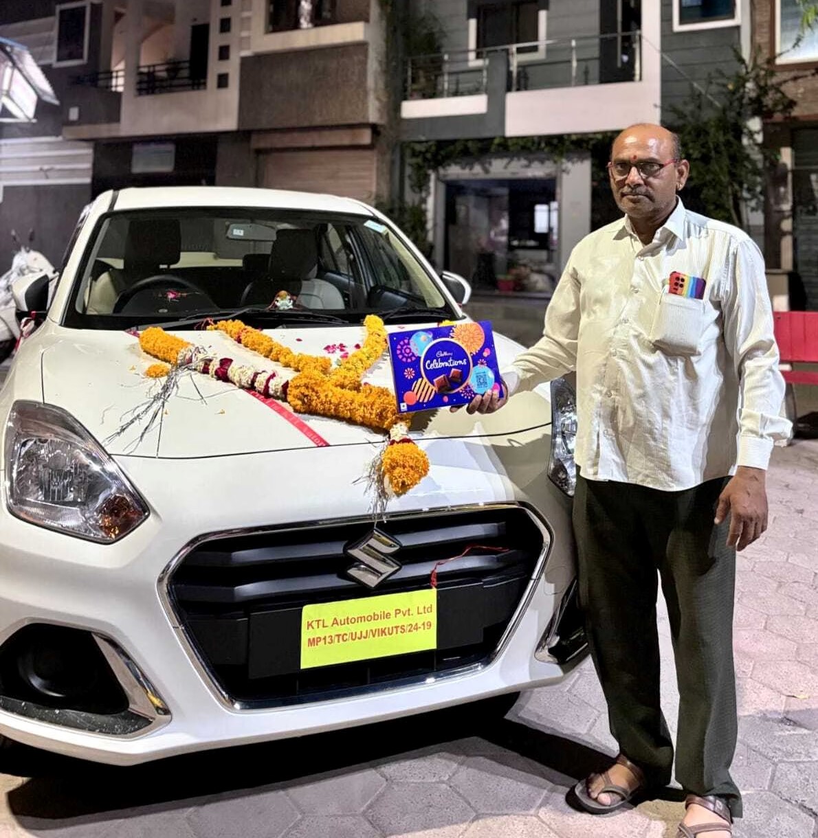 Hansji Tour and Travels chauffeur with car